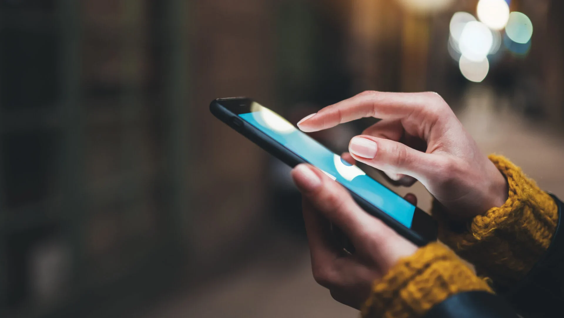 voicesage-case-study-woman-holding-her-phone